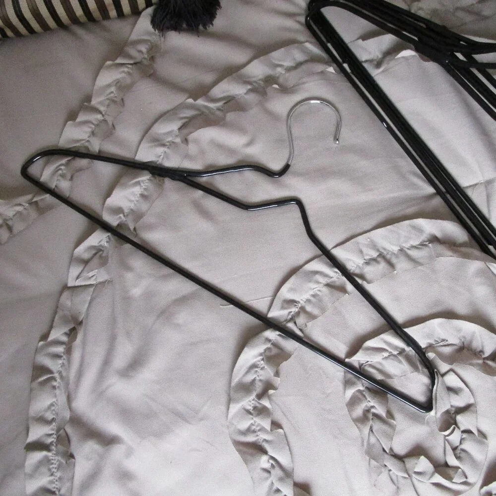 lot of heavy wire hangers